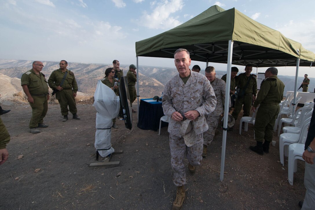 U.S. Marine Corps Gen. Joseph F. Dunford Jr., leaves an observation point after receiving a brief while visiting northern Israel, Oct. 18, 2015. DoD photo by D. Myles Cullen