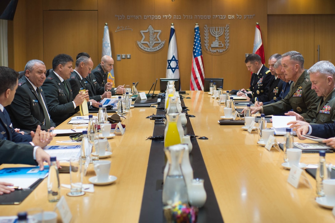 U.S. Marine Gen. Joseph F. Dunford Jr., second right, chairman of the Joint Chiefs of Staff, Lt. Gen. Gadi Eizenkot, second left, the commander-in-chief of the Israeli Defense Force, meet at the Israeli Defense Forces military headquarters in Tel Aviv, Israel, Oct. 18, 2015. DoD photo by D. Myles Cullen

