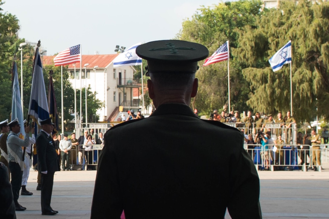 U.S. Marine Corps Gen. Joseph F. Dunford Jr., chairman of the Joint Chiefs of Staff, looks on at the start of an official welcoming ceremony at the Israeli Defense Forces military headquarters in Tel Aviv, Israel, Oct. 18, 2015. DoD photo by D. Myles Cullen
