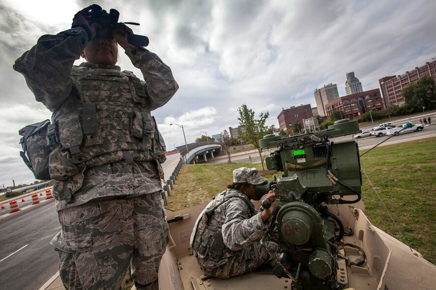 Senior Airman Kristine Rodriguez, left, and Staff Sgt. Shaquan Williams, both with the 108th Wing, New Jersey Air National Guard, keep watch at the Benjamin Franklin Bridge, located between Camden, N.J., and Philadelphia, Sept. 27, 2015. The joint New Jersey National Guard task force comprised of Soldiers with the 1st Squadron, 102nd Cavalry, and 108th Wing Airmen are assisting New Jersey civil authorities and the Delaware Port Authority with security during Pope Francis’s visit to Philadelphia Sept. 26-27. (U.S. Air National Guard photo by Master Sgt. Mark C. Olsen/Released)