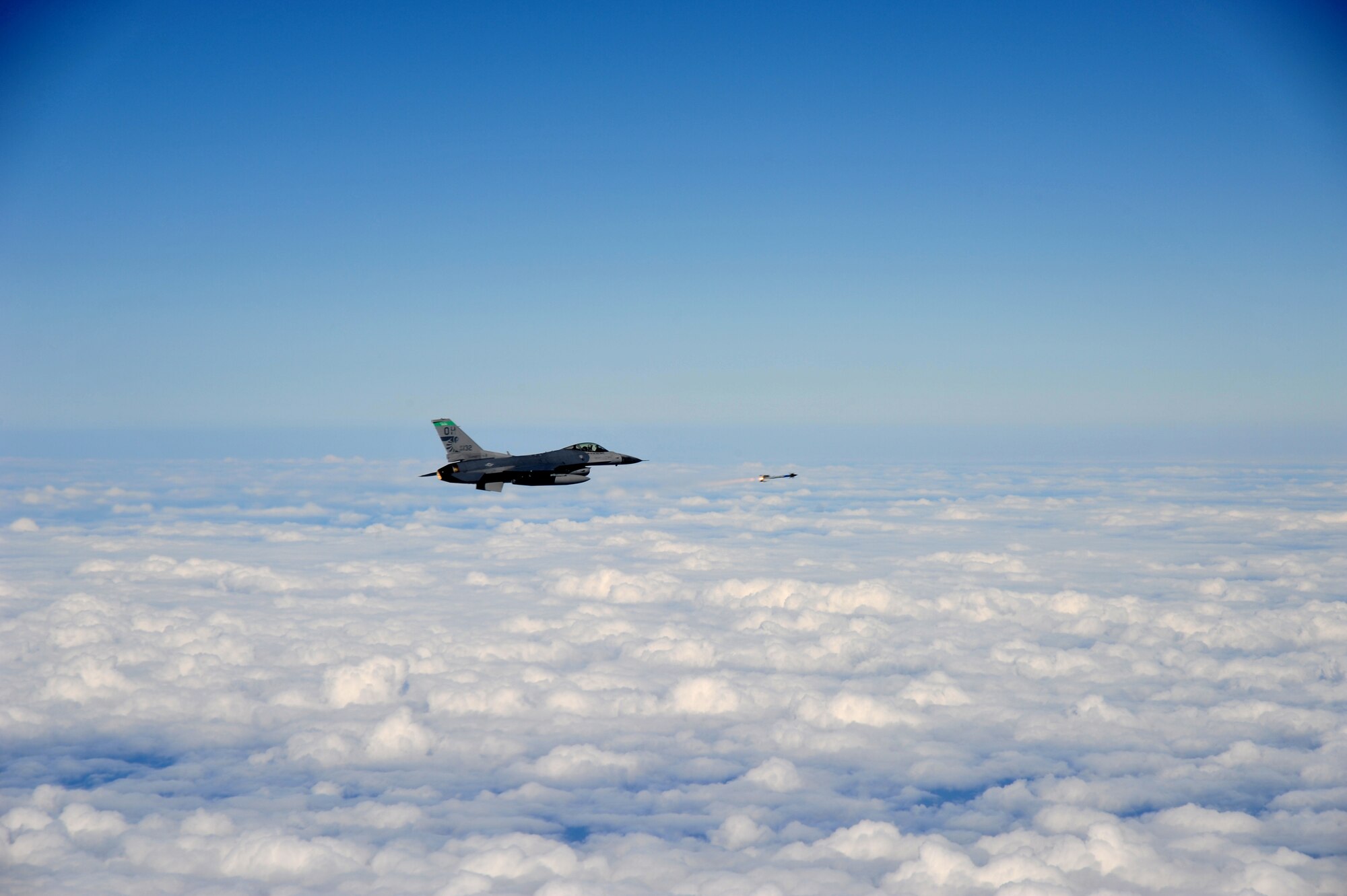 Lt. Col. Scott Schaupeter, an F-16 pilot with the 180th Fighter Wing, Ohio Air National Guard, flies an air-to-air sortie over the Gulf of Mexico Sept. 17. About 120 Airmen from the 180th FW traveled to Tyndall to participate in the Combat Archer exercise, a weapons system evaluation program designed to test the effectiveness of our Airmen and air-to-air weapon system capability of our F-16s and other combat aircraft. Training allows our pilots to provide a vital link for the defense of our country. Air National Guard photo by Maj. Garrick Webb/Released