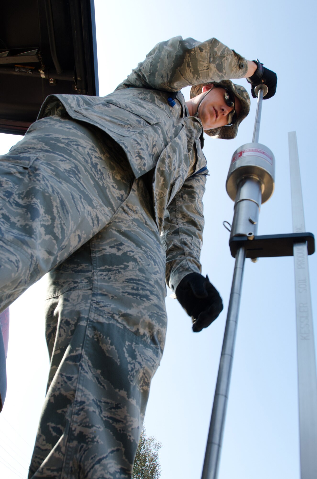 Tech Sgt. Nick Ketterer, an engineer for the Kentucky Air National Guard’s 123rd Civil Engineer Squadron, tests soil density during a training scenario at March Air Reserve Base, Calif., on June 10, 2015. The exercise was designed to simulate a real-world mission. (U.S. Air National Guard photo by Senior Airman Joshua Horton)
