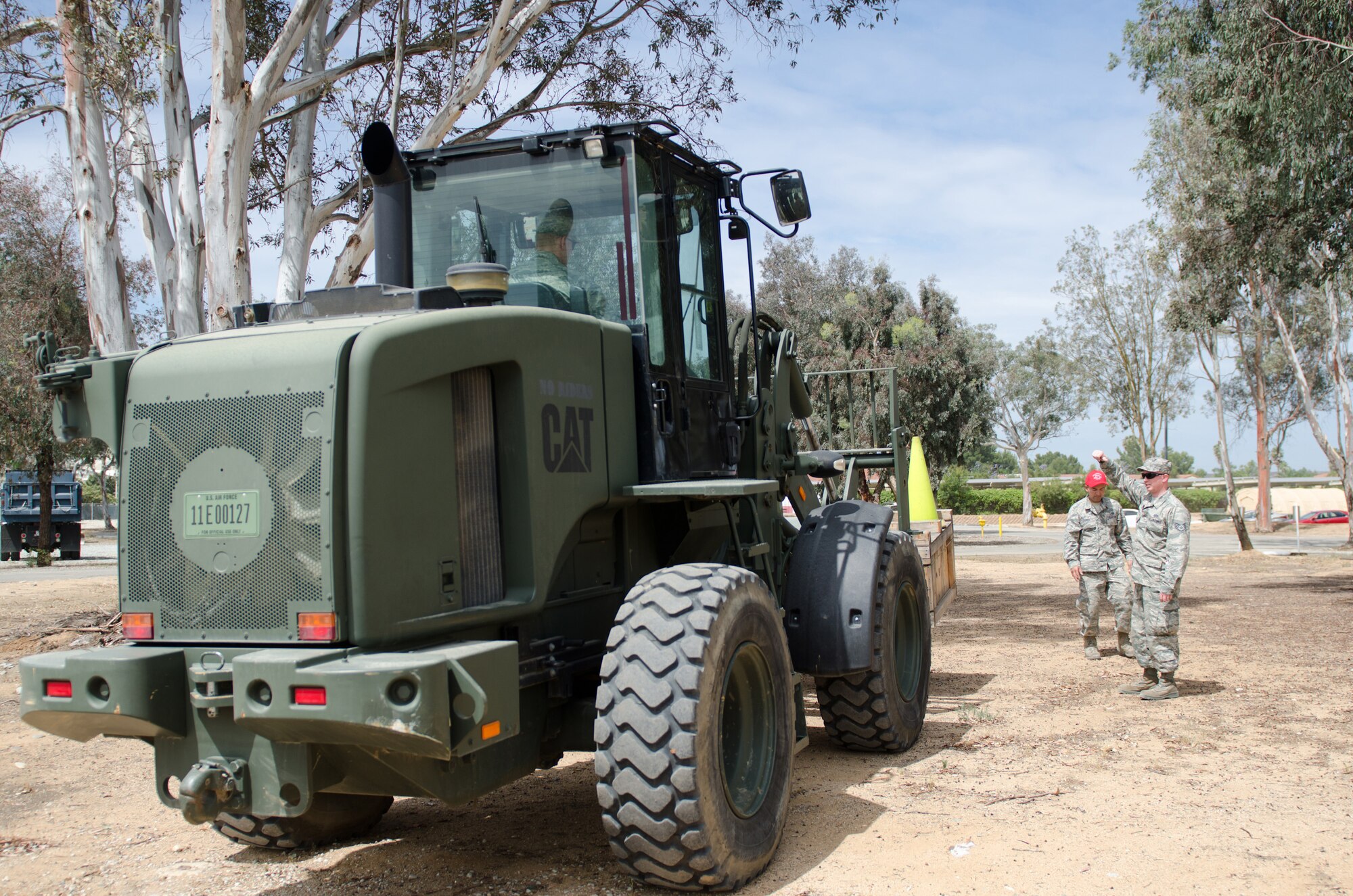 Heating, Ventilation and Air Conditioning technicians from the Kentucky Air National Guard’s 123rd Civil Engineer Squadron move HVAC equipment with a forklift during a training scenario at March Air Reserve Base, Calif., on June 9, 2015. The exercise was designed to simulate a real-world mission. (U.S. Air National Guard photo by Senior Airman Joshua Horton)