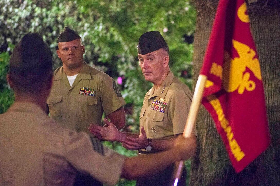 U.S. Marine Corps Gen. Joseph F. Dunford Jr., chairman of the Joint Chiefs of Staff, talks with U.S. Marine Corps security guards at the U.S. Consulate in Jerusalem, Oct. 17, 2015. DoD photo by D. Myles Cullen