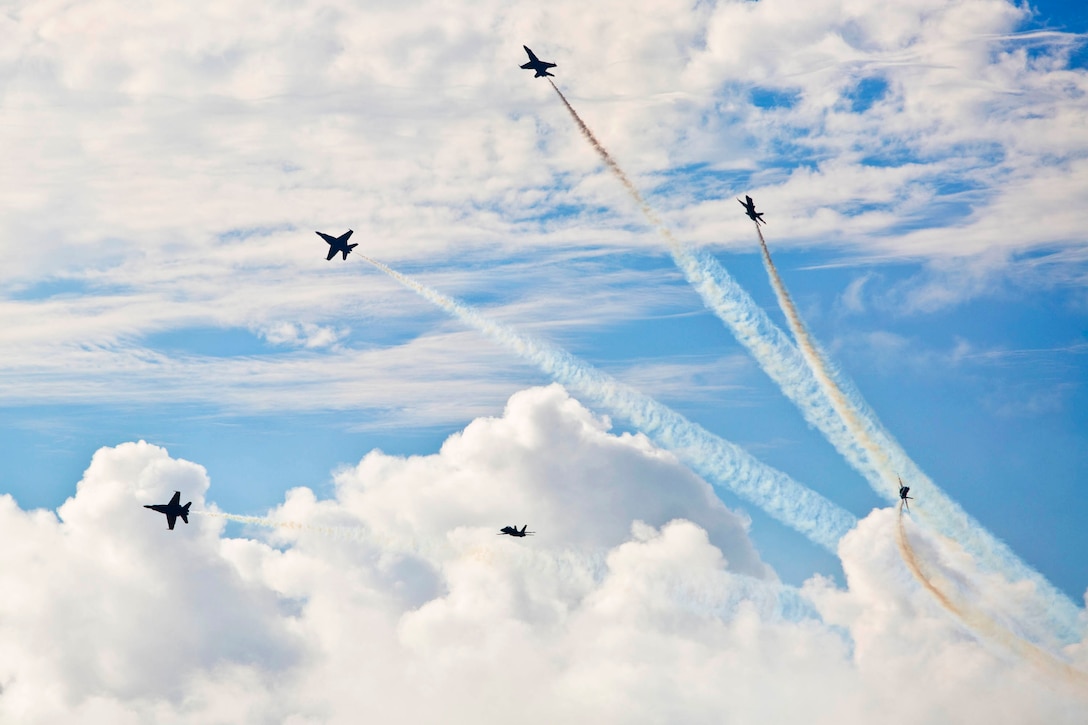 The Blue Angels, the U.S. Navy's flight demonstration squadron, perform a formation called the Delta Breakout during the 2015 Kaneohe Bay Air Show at Marine Corps Base Hawaii, Oct. 18, 2015. This year’s theme was “Joining Forces with the Community,” and the air show featured an array of acrobatic aerial performances by civilian performers and military drills and demonstrations by the U.S. Navy, Marine Corps, Army, Air Force and Coast Guard. U.S. Marine Corps photo by Cpl. Brittney Vito