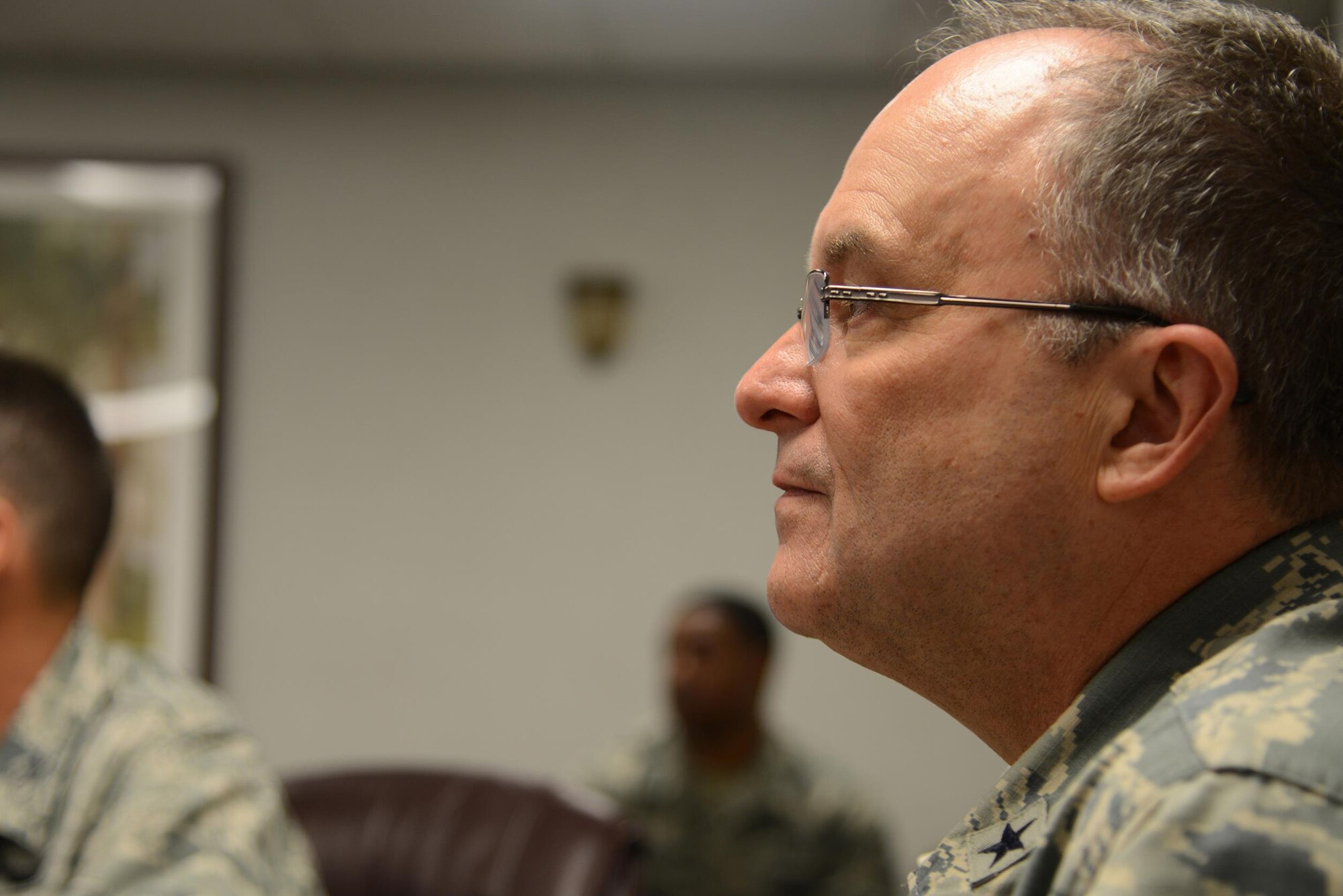 Brig. Gen. (Dr.) Lee E. Payne, Air Force Medical Operations Agency commander, receives a wing mission brief in the 47th Medical Group Clinic on Laughlin Air Force Base, Texas, Oct. 15, 2015. The 47th Medical Group is Laughlin Air Force Base's outpatient clinic providing primary and specialty care for Tricare beneficiaries in a patient centered medical home with a mission to deliver excellent health services to improve the health, readiness, and safety of the clinics customers and employees. (U.S. Air Force photo by Tech Sgt. Steven R. Doty)(Released)