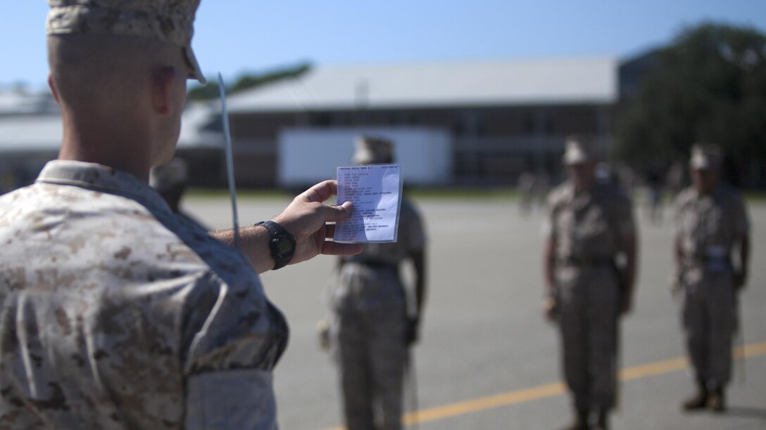 A Marine student attending dril instructor school prepares to announce the next order while practicing drill at Marine Corps Recruit Depot Parris Island, S.C., Oct. 15, 2015. Marines who attend drill instructor school are specially selected and the school is three months long.