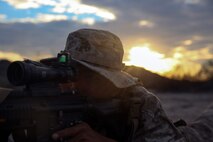 Lance Cpl. Anthony Sarmiento, a rifleman assigned to Company E, 2nd Battalion, 7th Marine Regiment, 1st Marine Division, provides security while establishing a defensive position during Talon Exercise 1-16 at Marine Corps Air Station, Yuma, Ariz., Oct. 12, 2015. The training took place at Baker’s Peak, a rugged desert training area located on the approximately 1,700,000 acre Barry M. Goldwater Range and was part of a larger event called Talon Exercise, which focused on offensive and defensive operations in desert and urban environments.