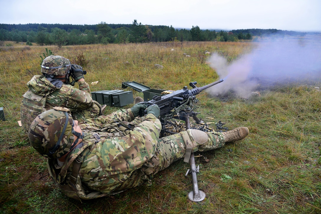 A U.S. soldier shoots targets with an M2 machine gun during exercise Rock Proof V at Bac Range, Postonja, Slovenia, Oct. 15, 2015. The soldiers are assigned to Company C, 2nd Battalion, 503rd Infantry Regiment, 173rd Airborne Brigade, stationed in Vicenza, Italy. Exercise Rock Proof V is a training exercise between U.S. soldiers and the Slovenian armed forces, focusing on small-unit tactics and building interoperability between these allied forces. U.S. Army photo by Paolo Bovo