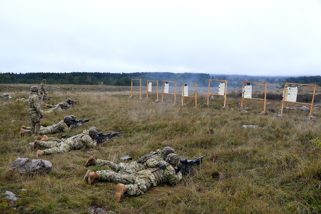 U.S. soldiers shoot targets with M240 machine gun during exercise Rock Proof V at Bac Range, Postonja, Slovenia, Oct. 15, 2015. The paratrooper soldiers are assigned to Company C, 2nd Battalion, 503rd Infantry Regiment, 173rd Airborne Brigade, stationed in Vicenza, Italy. Exercise Rock Proof V is a training exercise between U.S. soldiers and the Slovenian armed forces, focusing on small-unit tactics and building interoperability between these allied forces. U.S. Army photo by Paolo Bovo