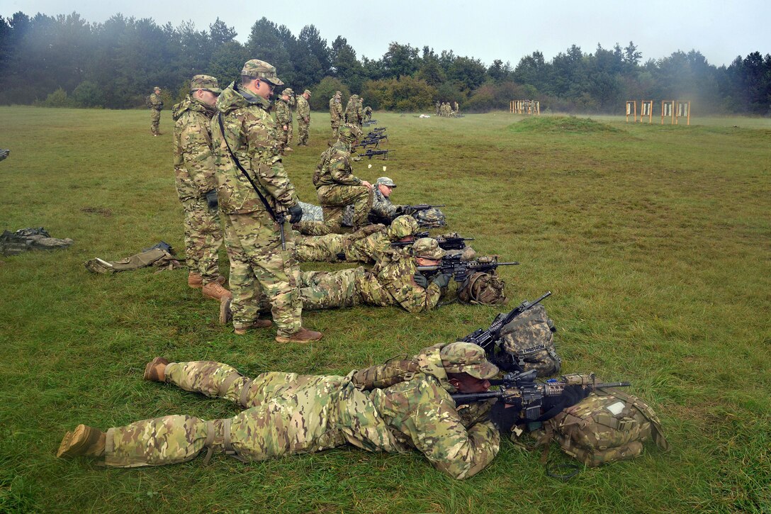 U.S. soldiers shoot targets with the M4 carbine rifle during exercise Rock Proof V at Bac Range, Postonja, Slovenia, Oct. 15, 2015. The paratrooper soldiers are assigned to Company C, 2nd Battalion, 503rd Infantry Regiment, 173rd Airborne Brigade, stationed in Vicenza, Italy. Exercise Rock Proof V is a training exercise between U.S. soldiers and the Slovenian armed forces, focusing on small-unit tactics and building interoperability between these allied forces. U.S. Army photo by Paolo Bovo