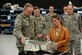 Eileen Frock, the 570th Aircraft Maintenance Squadron operations officer, briefs Air Force Chief of Staff Gen. Mark A. Welsh III on an F-35 Lightning II replacement modification at Hill Air Force Base, Utah, Oct. 15, 2015. The part depicted, a root rib, was removed from an F-35 airframe, and a stronger replacement was added, extending the aircraft’s service life. During his visit, Welsh received an overview of Ogden Air Logistics Complex facilities and operations. (U.S. Air Force photo/R. Nial Bradshaw)