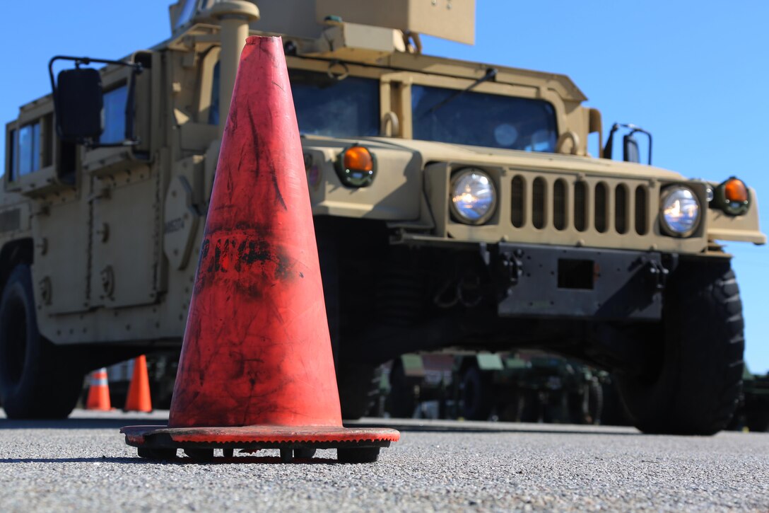 Marines maneuver a Humvee through a modified barrier during an Incidental Humvee Licensing Course at Marine Corps Air Station Cherry Point, N.C., Oct. 15, 2015. Marine Wing Support Squadron 274 Marines underwent an extensive course that covered basic operational skills, vehicle capabilities, emergency procedures and first echelon mechanics. The Humvee has many versatile roles throughout the Marine Corps. Taking licensing courses to qualify Marines of different occupational fields helps expand their skill sets while allowing their unit to be more self-sufficient. 