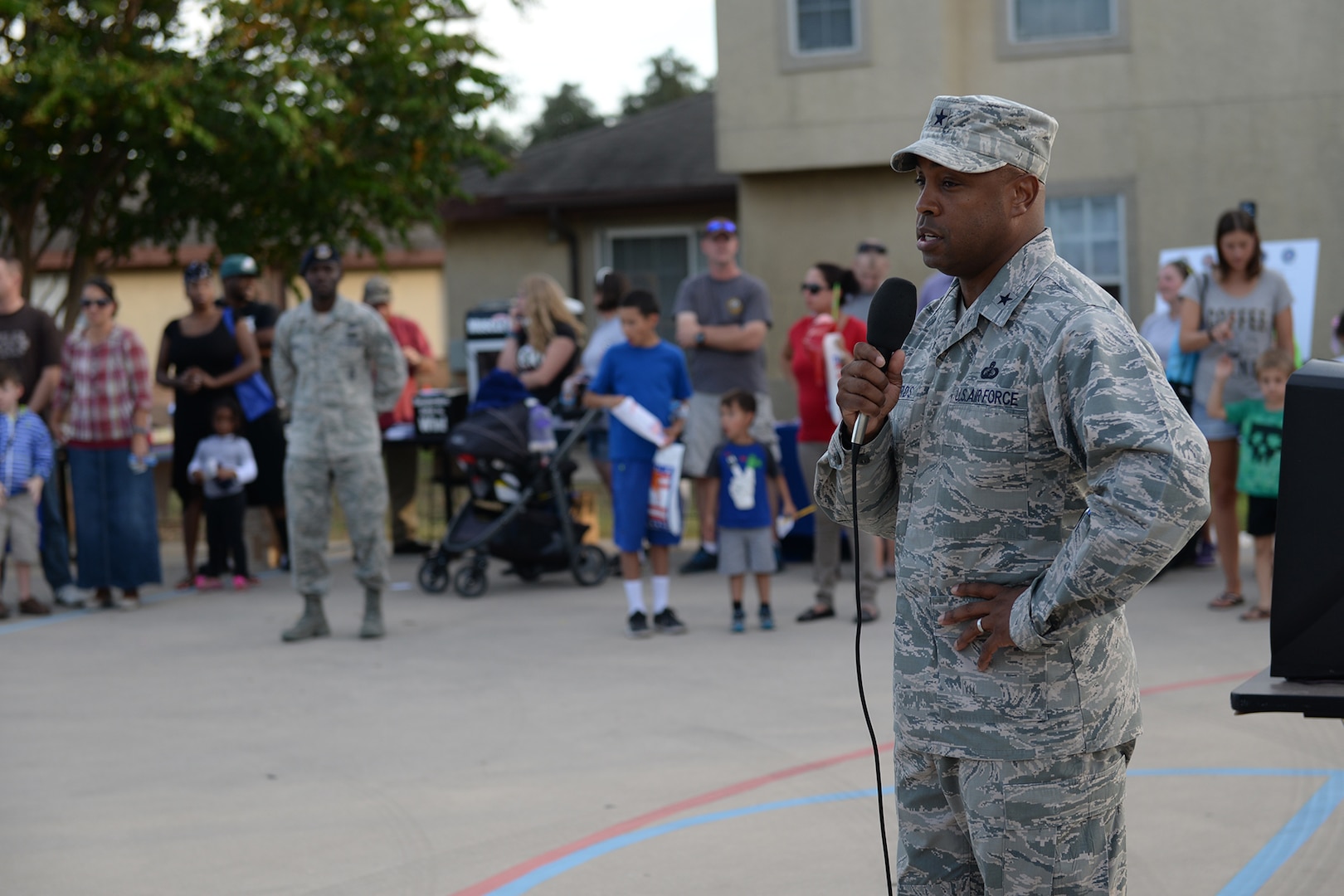 Brig. Gen. Trent Edwards, 37th Training Wing commander, provides opening remarks to start National Night Out Oct. 6, 2015, at Joint Base San Antonio-Lackland, Texas. The annual event is sponsored by the National Association of Town Watch, which is a non-profit crime prevention organization. (U.S. Air Force photo by Senior Airman Krystal Wright/Released)