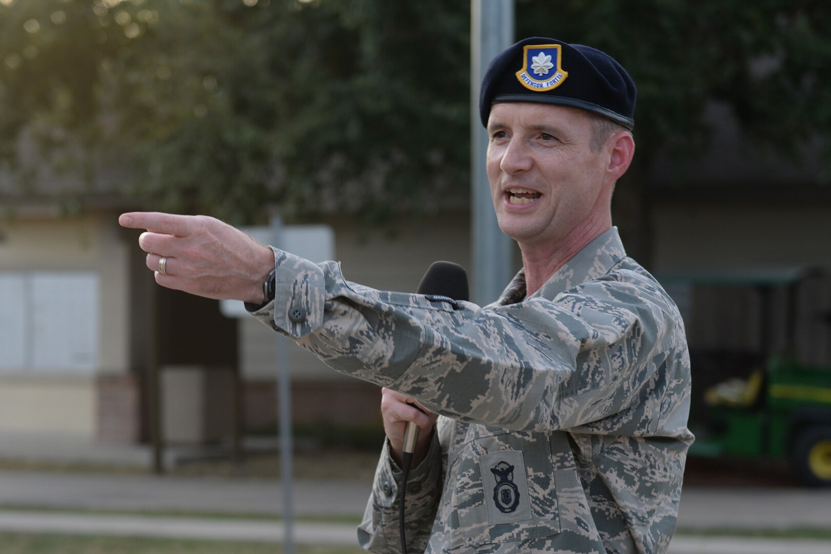 Lt. Col. Robert Ford, 802nd Security Forces Squadron commander, welcomes the community to National Night Out during opening remarks Oct. 6, 2015, at Joint Base San Antonio-Lackland, Texas. Approximately 300 people attended the event, which is held annually in every town and city nation-wide. (U.S. Air Force photo by Senior Airman Krystal Wright/Released)
