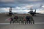 U.S. Air Force Lt. Gen. John L. Dolan, U.S. Forces Japan commander, and Japan Air Self-Defense Force Lt. Gen. Yoshiyuki Sugiyama, Air Defense Command commander (center), pose for a photo alongside base leadership at Misawa Air Base, Japan, Oct. 14, 2015. This followed the conclusion of a bilateral exchange flight by both generals which served as a testament to the strong alliance between U.S. and Japan. 
