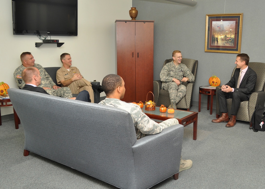 DLA Energy Commander Air Force Brig. Gen. Mark McLeod, second from right, and other DLA Energy leaders met with Service des Essences des Armées Maj. Paul Kaeser, right, during his visit to DLA Energy headquarters at the McNamara Headquarters Complex, Fort Belvoir, Virginia, Oct. 14.