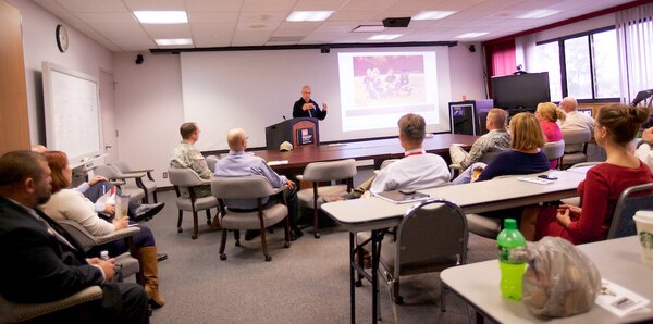 Joe Ruszala, a Vietnam veteran and member of Dog Tags Niagara talks to the staff of the USACE Buffalo District in support of National Disability Awareness Month.