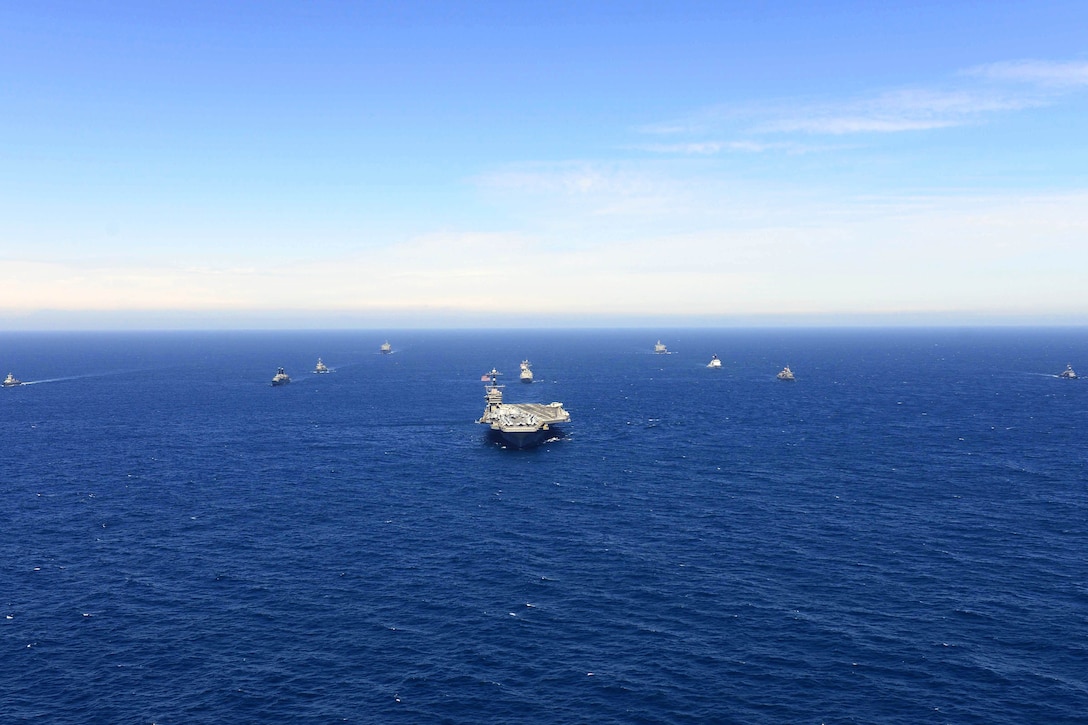 The USS George Washington steams in formation with Mexico, Chile and Colombia during UNITAS 2015 PHOTOEX, off the coast of Chile, Oct. 17, 2015. This is the 56th iteration of UNITAS, the U.S. Navy's longest running annual multinational maritime exercise, and a part of Southern Seas 2015. U.S. Navy photo by Petty Officer 2nd Class Adam Henderson