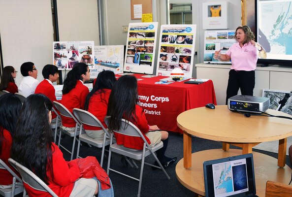 Lisa Baron, marine biologist and Project Manager interacts with students during Estuary Day at the Peterstown Community Center in Elizabeth NJ.  The event exemplified a strong partnership with a common goal -- to inform our future leaders about the importance of sustaining and improving the health of the NY/NJ Harbor estuary. 
