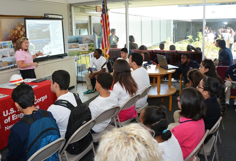 At the Peterstown Community Center in Elizabeth NJ, Lisa Baron, marine biologist and Project Manager interacts with students during Estuary Day.  The event exemplified a strong partnership with a common goal -- to inform our future leaders about the importance of sustaining and improving the health of the estuary. 