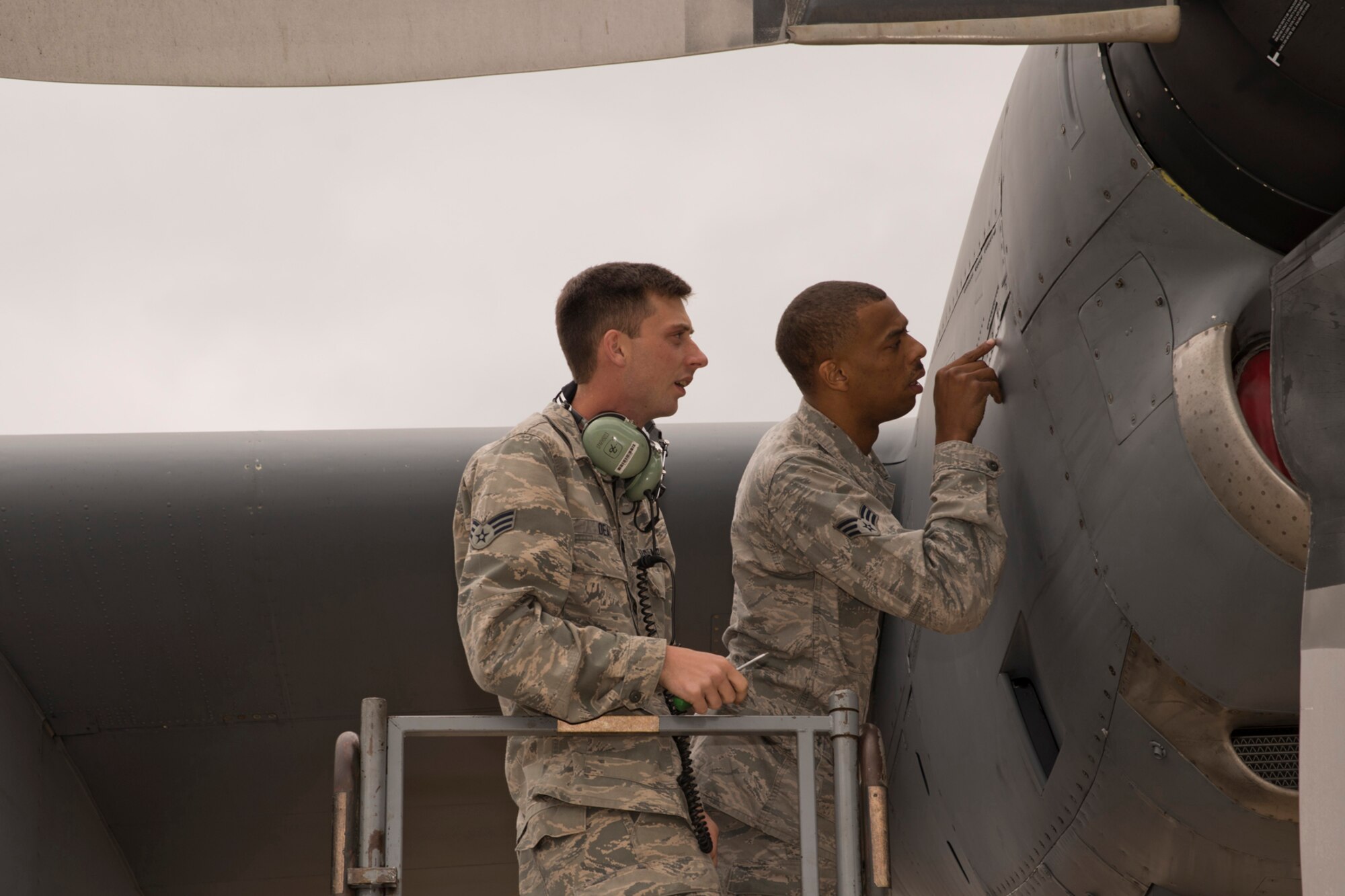 Two U.S. Air Force Airmen assigned to the 913th Maintenance Squadron, conduct a post flight inspection on the flightline at Little Rock Air Force Base, Ark., Oct. 3, 2015. The Airmen were participating in Operation MOBEX 2015, which was an aerial port deployment training exercise.  
(U.S. Air Force photo by Master Sgt. Jeff Walston/Released)
