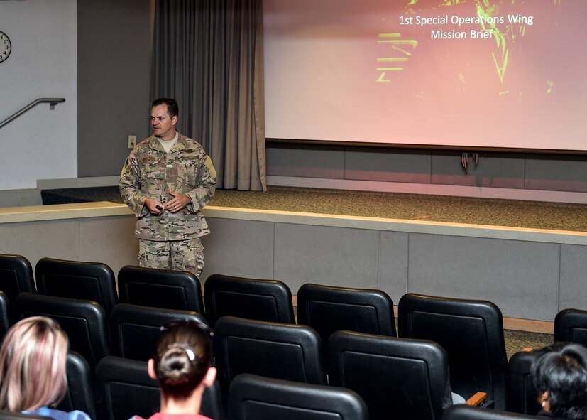 Col. Sean Farrel, 1st Special Operations Wing commander, gives a mission brief during spouse flight day at Hurlburt Field, Fla., Oct. 17, 2015. The spouse flight day allowed Airmen’s spouses an opportunity to see what they do on a day-to-day basis and understand the 1st SOW mission (U.S. Air Force photo by Senior Airman Jeff Parkinson)