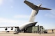 Colorado Air National Guard Airmen from the 233d Space Group, Greeley Air National Guard Station, load a Mission Vehicle 118 onto a C-17 Globemaster III at Buckley Air Force Base, Colo., Oct. 17, 2015. This exercise is part of the 140th Wing’s four-day wartime readiness inspection, which is an implementation of the new Air Force Inspection System, and will assess the wing's ability to perform their combat missions. (U.S. Air National Guard photo by Tech. Sgt. Nicole Manzanares)