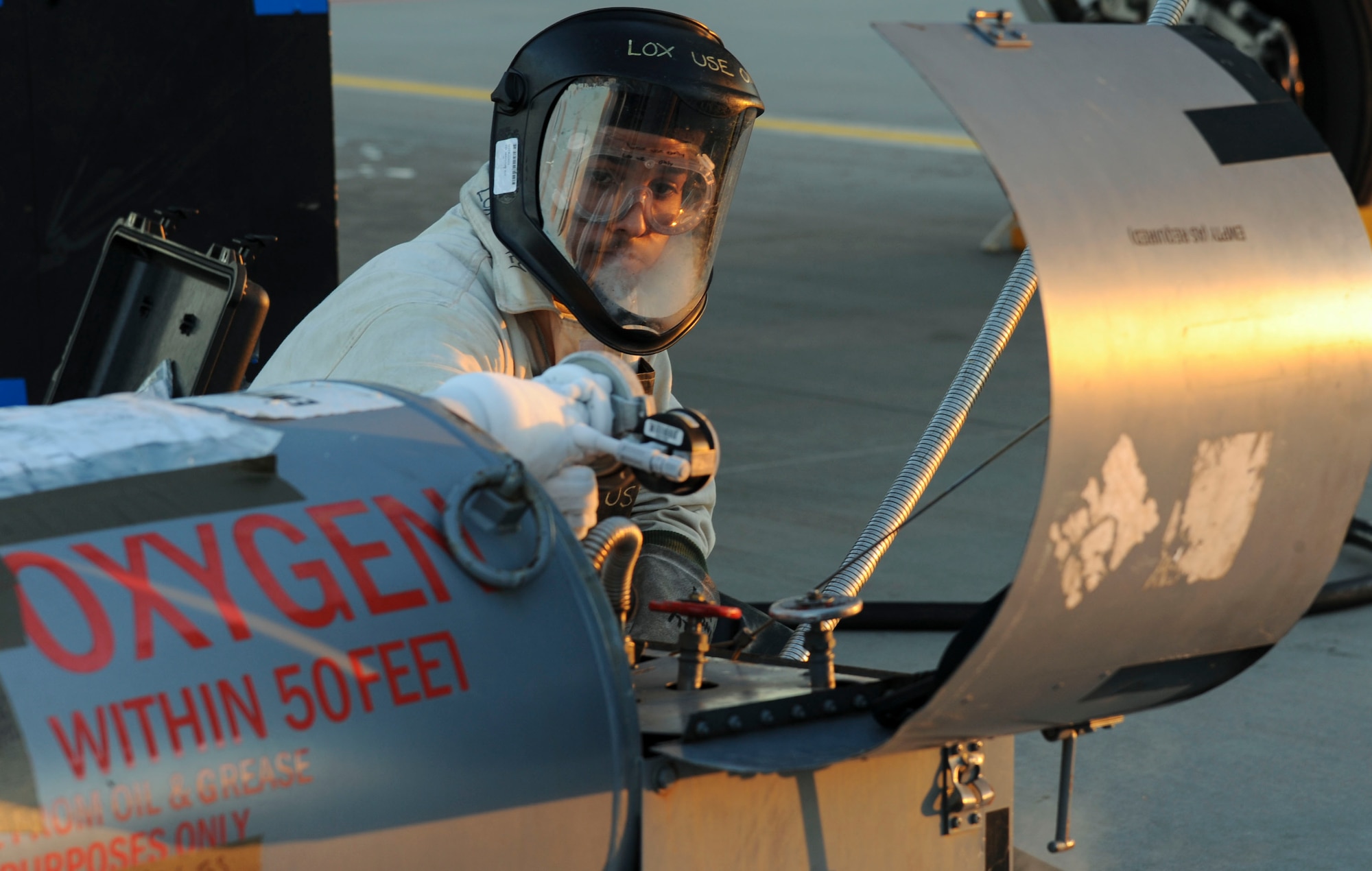 U.S. Air Force Senior Ashviel Cruz Aponte,  74th Expeditionary Fighter Squadron crew chief, services the liquid oxygen system on an A-10 Thunderbolt II attack aircraft at Amari Air Base, Estonia, Oct. 5, 2015. Liquid oxygen is used in aircraft as a source of oxygen for pilots to breathe at high altitudes. (U.S. Air Force photo by Andrea Jenkins/Released)