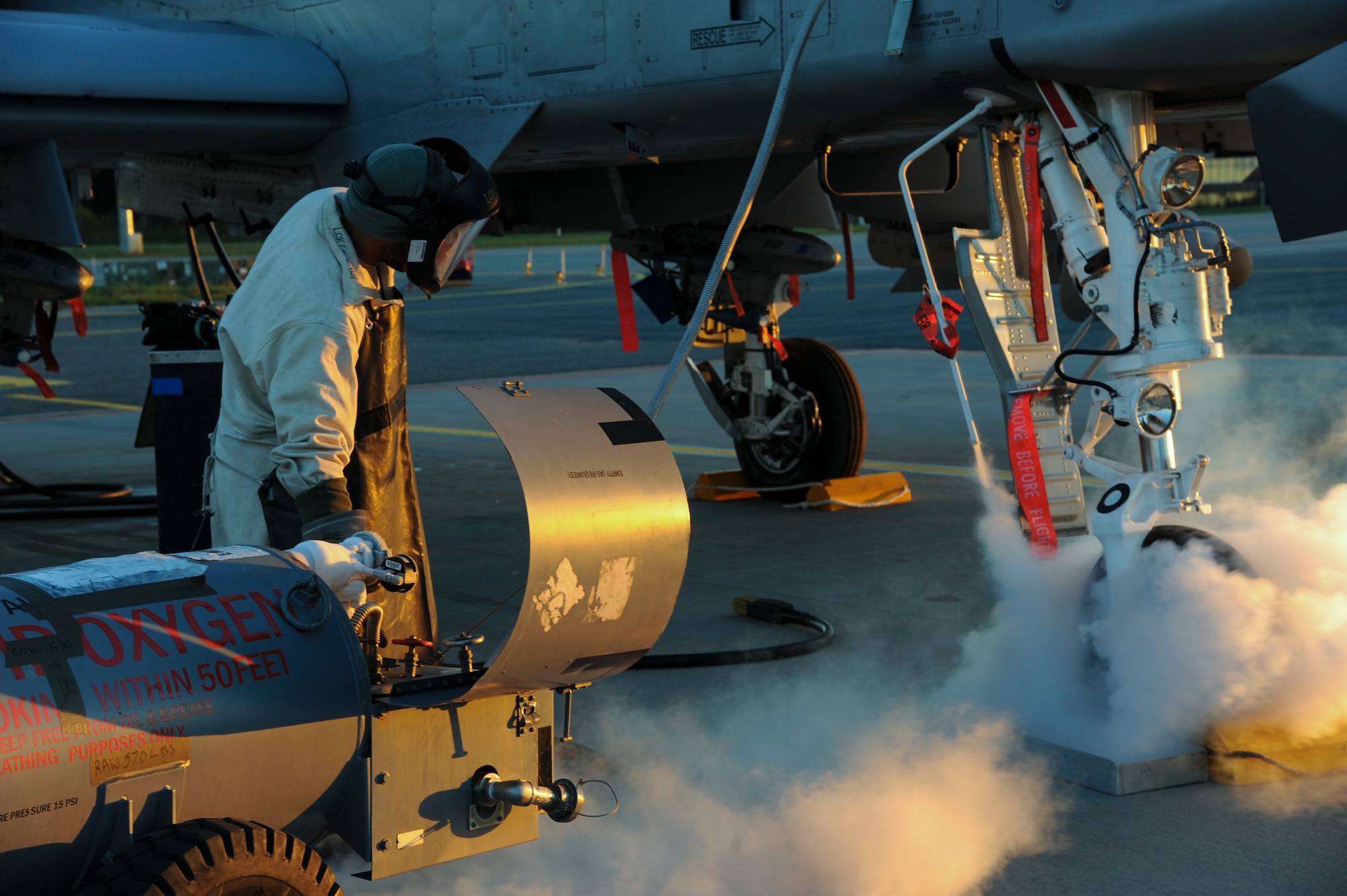 U.S. Air Force Senior Ashviel Cruz Aponte,  74th Expeditionary Fighter Squadron crew chief, services the liquid oxygen system on an A-10 Thunderbolt II attack aircraft at Amari Air Base, Estonia, Oct. 5, 2015. Cruz Aponte is deployed as part of a Theater Security Package in support of Operation Atlantic Resolve.  (U.S. Air Force photo by Andrea Jenkins/Released)