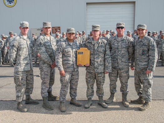 (From the left) Senior Airman Dennis Clark, Staff Sgt. Tyler Ford, Airman 1st Class Joshuajun Manuel, Senior Airman Blake Dillon, Tech. Sgt. Matthew Gibson and Staff Sgt. Derek Hansen pose for a photo after being declared the 3rd annual CE Readiness Challenge Champions Oct. 15, 2015 at Mountain Home Air Force Base, Idaho. The airmen are assigned to various sections in the squadron and came together for a look at how each other’s jobs are done. (U.S. Air Force photo by Airman 1st Class Connor J. Marth)