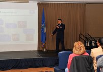 Col. Anthony Hernandez, 319th Mission Support Group commander, provides a mission brief to retirees attending Retiree Appreciation Day on Grand Forks Air Force Base, North Dakota, Oct. 16, 2015. About 40 retirees visited the base to participate in the day's events. (U.S. Air Force photo/Airman 1st Class Bonnie Grantham/Released)