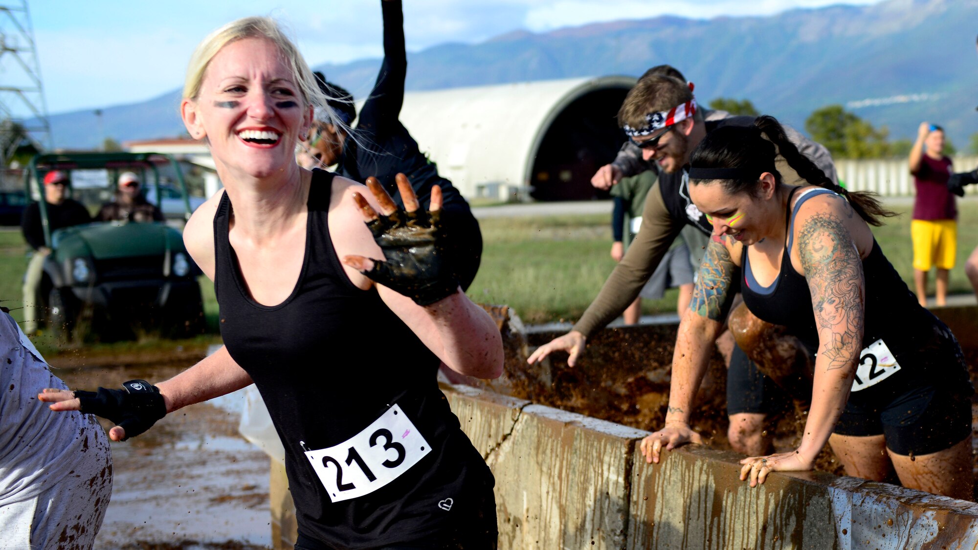 Team Aviano members begin the Wyvern Mud Run, Oct. 17, 2015, at Aviano Air Base, Italy. The Wing Diversity Council and 31st Civil Engineer Squadron hosted the event, which awarded prizes to the top male and female, top team and top squadron team. (U.S. Air Force photo by Senior Airman Areca T. Bell/Released)