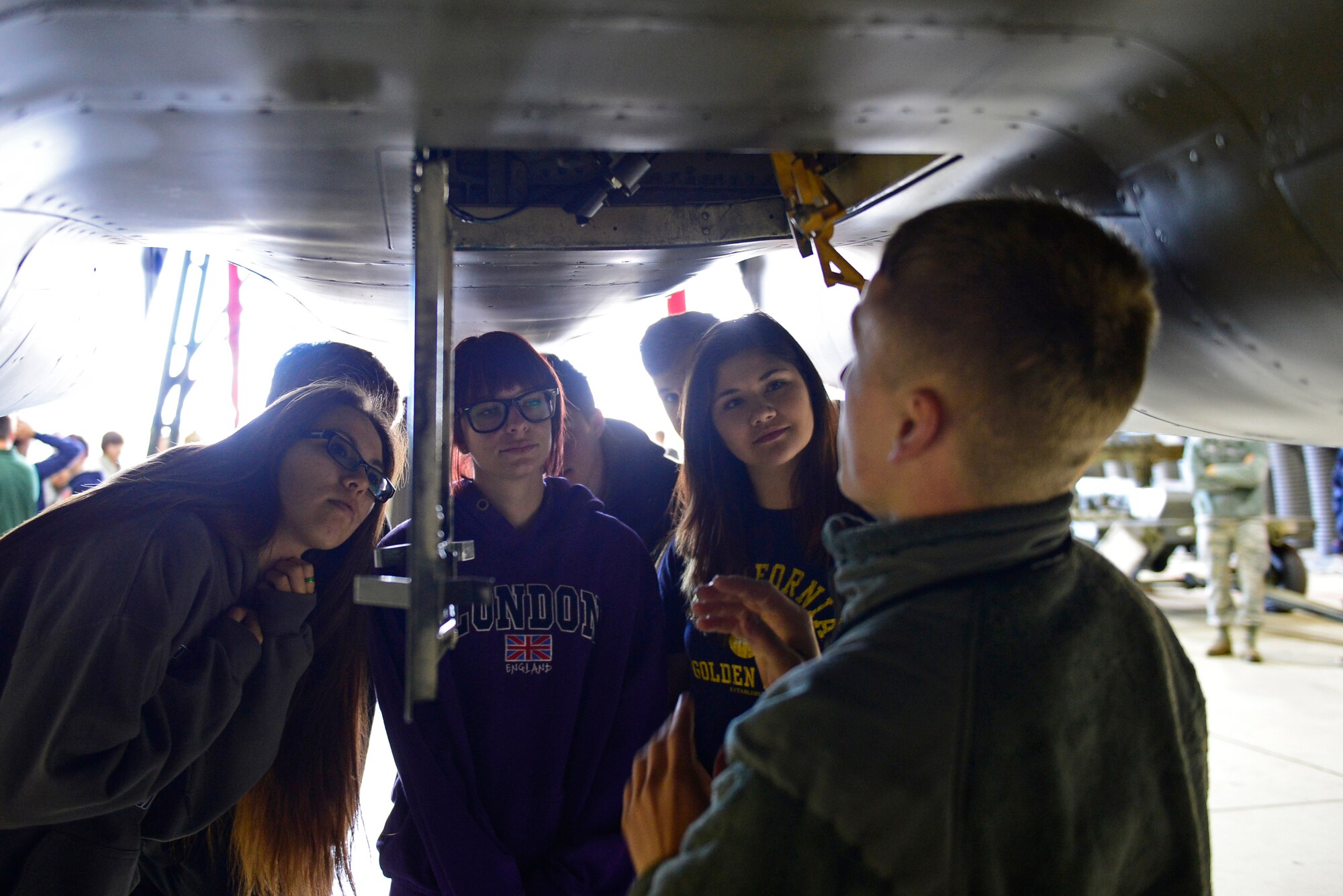 A 493rd Aircraft Maintenance Squadron weapons system specialist explains the basics of the the missile system of aa F-15C Eagle to Lakenheath High School students at Royal Air Force Lakenheath, England, Oct. 14, 2015, during their educational field trip to learn about the mission of the 48th Fighter Wing. The event gave LHS seniors the opportunity to gain an appreciation and understanding of the mission at RAF Lakenheath. (U.S. Air Force photo by Airman 1st Class Erin R. Babis/Released)