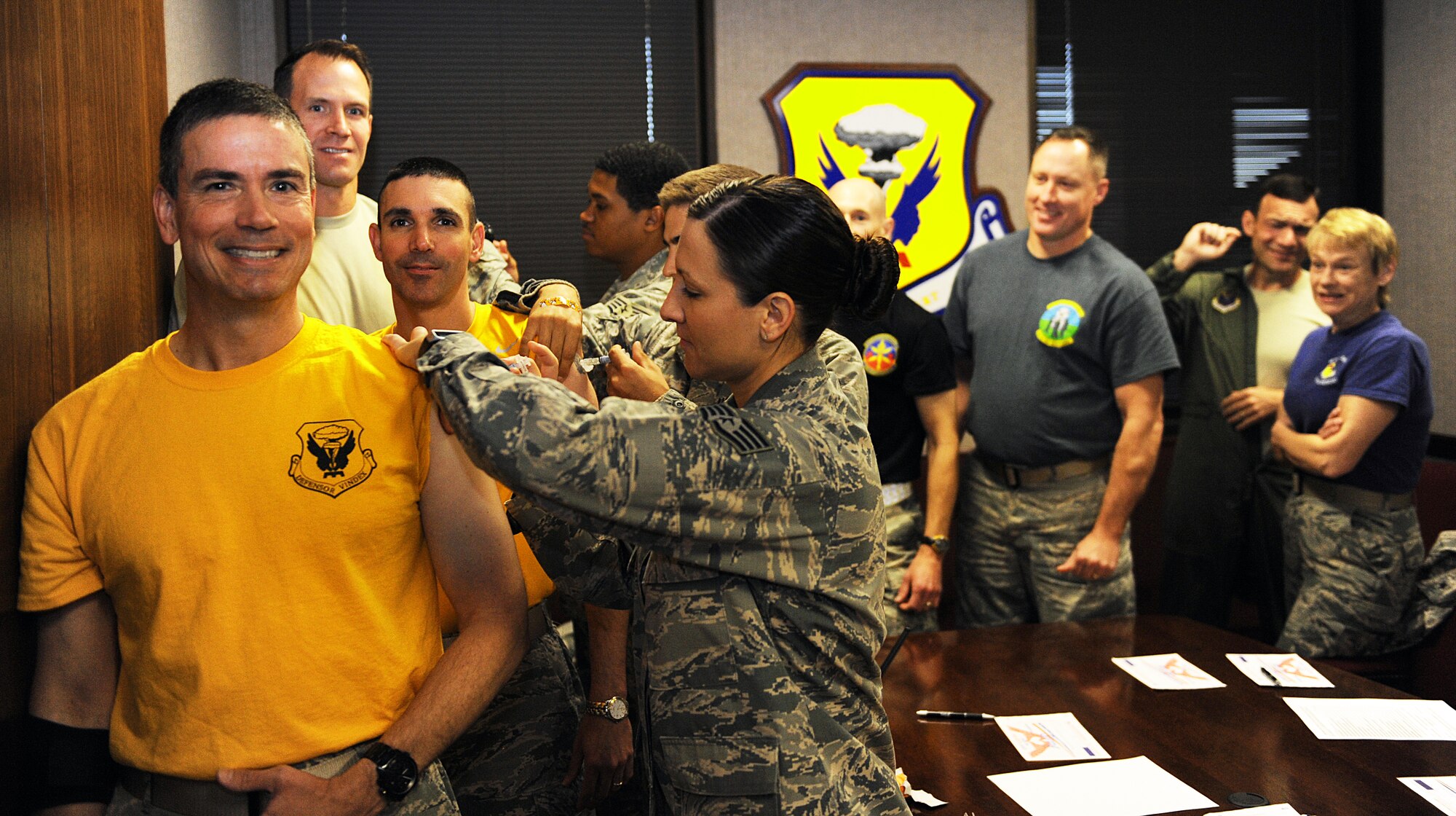 Brig. Gen. Paul Tibbets IV, 509th Bomb Wing (BW) commander, receives an influenza Leadership influenza vaccination along with other 509th BW leaders, Oct. 16, 2015, at Whiteman Air Force Base, Mo. Active duty members are required to receive a yearly vaccination. (U.S. Air Force photo by Tech. Sgt. Miguel Lara/Released)