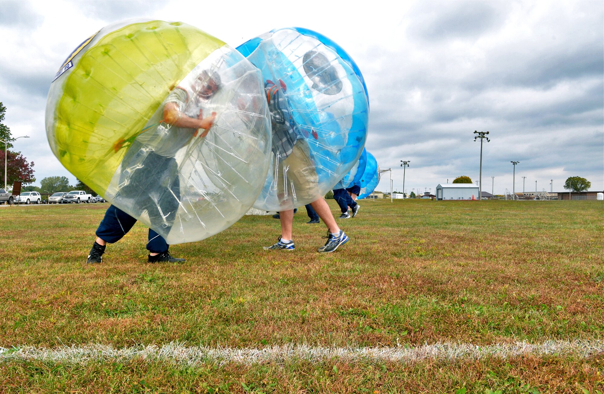 Whiteman Warriors clash during a bubble-soccer game as part of Wingman Day, Oct. 9, 2015 at Whiteman Air Force Base, Mo. The wing held activities that contributed to mental, physical, social and spiritual fitness. (U.S. Air Force photo by Tech. Sgt. Miguel Lara III/Released)