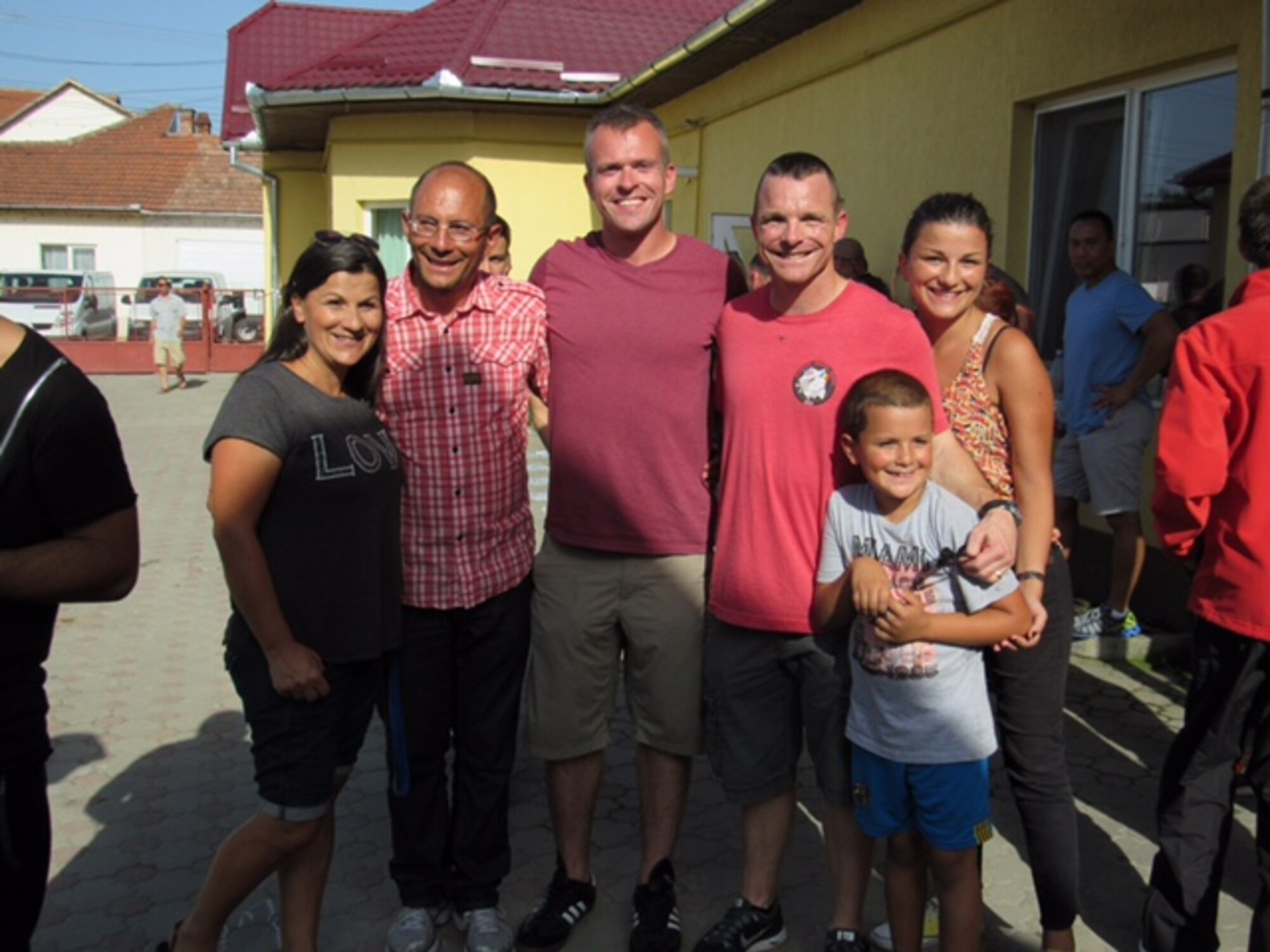 Members of the 123rd Expeditionary Fighter Squadron spend the day with children at a local orphanage near Campia Turzii, Romania, Sept. 19, 2015. (Photo courtesy of 123rd Expeditionary Fighter Squadron)