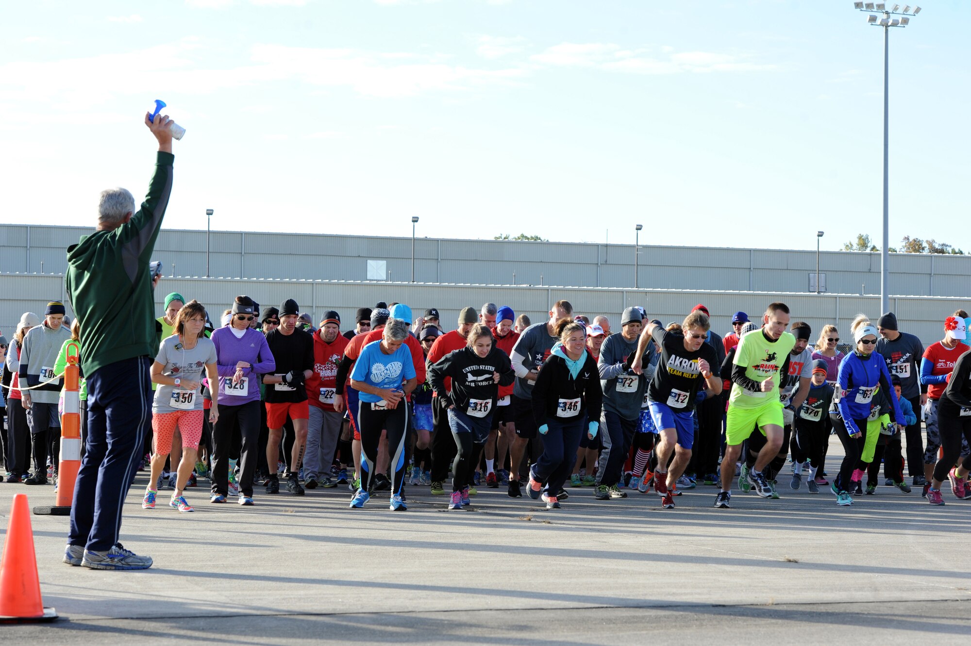 Men and Women of the 180th FW traded combat boots for running shoes, joining local community members in the I Believe I can Fly 5k race, hosted by the Arms Forces Organization, raising awareness about traumatic brain injuries Oct. 18, 2015. The Arms Forces provides education and programs allowing veterans past and present, who have a traumatic brain injury or post-traumatic stress disorder to find understanding, purpose and direction as they face the other war while living at home with their invisible injury. Air National Guard Photo by Staff Sgt. John Wilkes/Released.