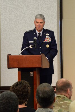 Lt. Gen. Samuel Cox speaks to members of 18th Air Force during his Assumption of Command ceremony at the Scott Club on Scott Air Force Base, Oct. 19, 2015. As 18th AF commander, Cox will lead Air Mobility Command’s operational mission as Air Forces Transportation, the air component of U.S. Transportation Command. He is responsible for the command’s worldwide operational mission of providing rapid, global mobility and sustainment for America’s armed forces through airlift, aerial refueling, aeromedical evacuation, and contingency response. Additionally, Cox also commands Task Force 294, which oversees Air Force tanker operations in support of U.S. Strategic Command. (U.S. Air Force photo by Master Sgt. Thomas J. Doscher