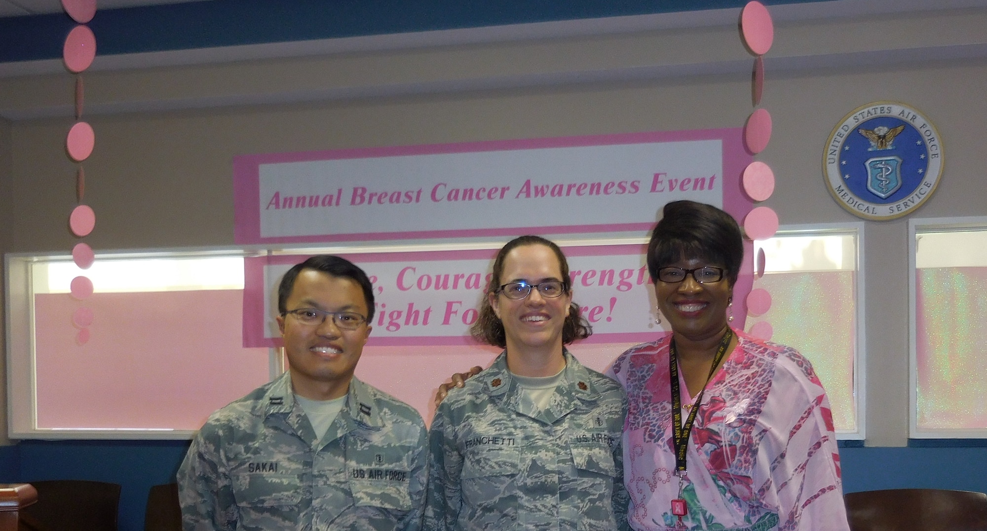 Capt. (Dr.) Isami Sakai, 779 MDG General Surgeon, Maj. (Dr.) Christina Franchetti, 779 MDG, General Surgeon, and Dr. LaRay Imani Price, 779 MDG Psychologist discussed the clinical and psychological impact of breast cancer at an event to raise awareness about breast cancer and the importance of early detection on Oct. 16. (Photo by Kathy Canfield)