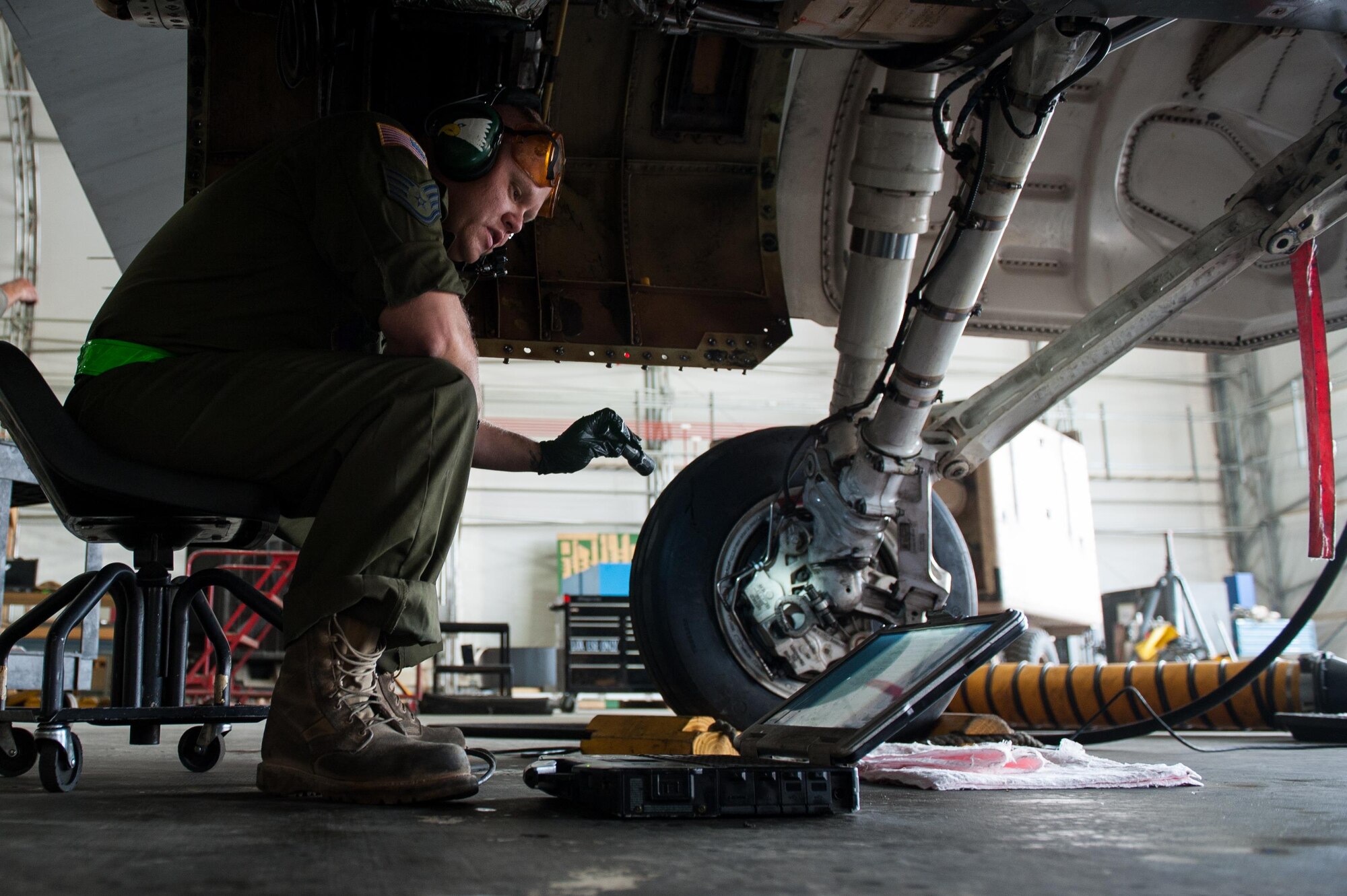 U.S. Air Force Staff Sgt. Matthew Lawson assigned to the 455th Expeditionary Maintenance Squadron, works to complete a 400-hour phase inspection on an F-16 Fighting Falcon aircraft Oct. 18, 2015, at Bagram Airfield, Afghanistan. The phase inspection team conducts inspections after every 400 hours of flight. (U.S. Air Force photo by Tech. Sgt. Joseph Swafford/Released)