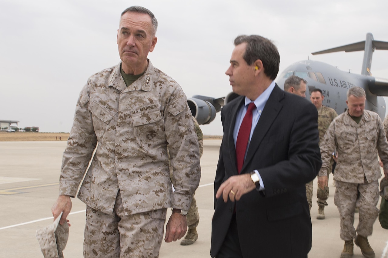 U.S. Ambassador to Iraq Stuart E. Jones greets U.S. Marine Corps Gen. Joseph F. Dunford Jr., chairman of the Joint Chiefs of Staff, upon his arrival in Irbil, Iraq, Oct. 20, 2015. DoD photo by D. Myles Cullen
