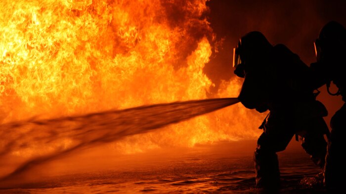 Aircraft Rescue and Firefighting Marines tackle some of their first fuel fires at Marine Corps Air Station Cherry Point, N.C., Oct. 16, 2015. The training exercise taught the new Marines how to battle the heat and keep pushing until they annihilate the flames, as well as get used to the environment of a real fire.