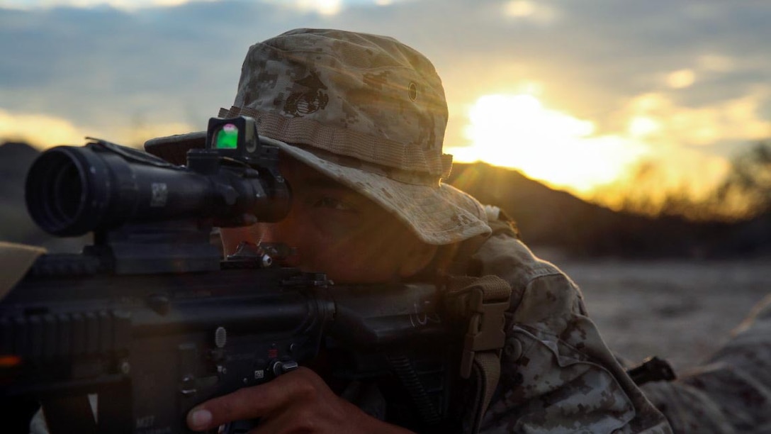 Lance Cpl. Anthony Sarmiento, a rifleman assigned to Company E, 2nd Battalion, 7th Marine Regiment, 1st Marine Division, provides security while establishing a defensive position during Talon Exercise 1-16 at Marine Corps Air Station, Yuma, Ariz., Oct. 12, 2015. The training took place at Baker’s Peak, a rugged desert training area located on the approximately 1,700,000 acre Barry M. Goldwater Range and was part of a larger event called Talon Exercise, which focused on offensive and defensive operations in desert and urban environments.