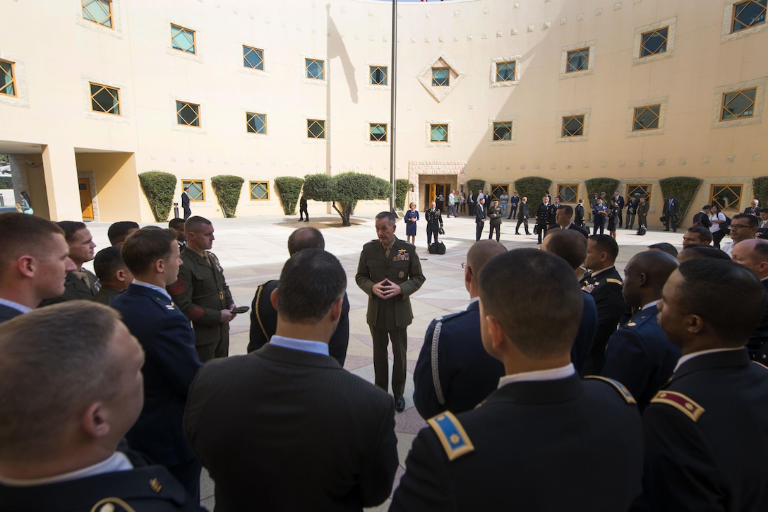 U.S. Marine Corps Gen. Joseph F. Dunford Jr., chairman of the Joint Chiefs of Staff, talks with U.S. service members assigned to the U.S. Embassy in Amman, Jordan, Oct. 19, 2015. DoD photo by D. Myles Cullen