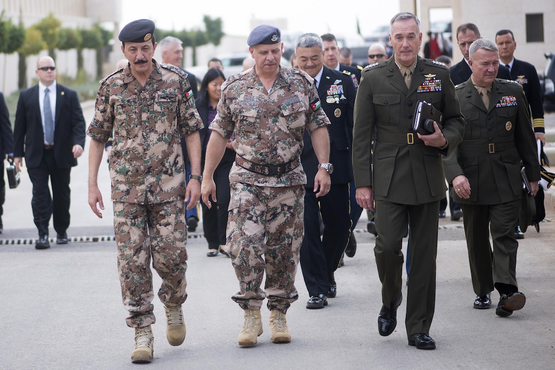 From left, Jordanian Chief of Defense Gen. Mashal al-Zaben, Jordanian Prince Faisal and U.S. Marine Corps Gen. Joseph F. Dunford Jr., chairman of the Joint Chiefs of Staff, walk to the Al Husseiniya Palace in Amman, Jordan, Oct. 19, 2015. DoD photo by D. Myles Cullen