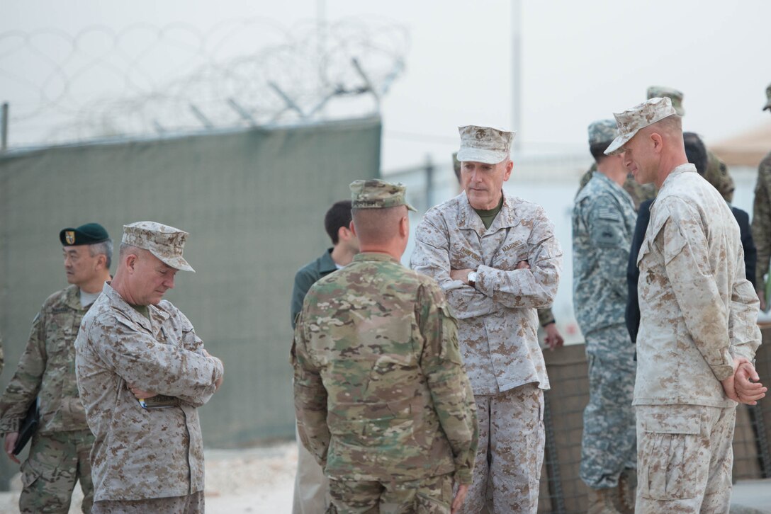 U.S. Marine Corps Gen. Joseph F. Dunford Jr., center right, chairman of the Joint Chiefs of Staff, talks with U.S. service members at a joint training center near Amman, Jordan, Oct. 19, 2015. DoD photo by D. Myles Cullen