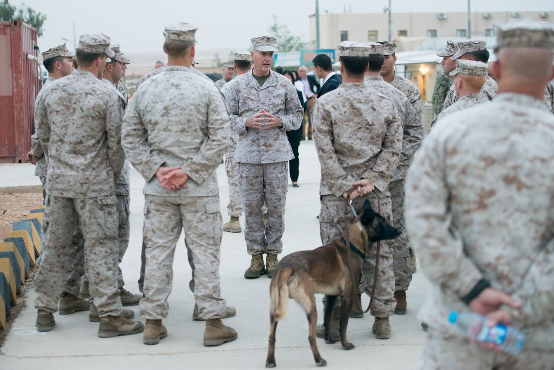 U.S. Marine Corps Gen. Joseph F. Dunford Jr., center, chairman of the Joint Chiefs of Staff, talks with U.S. Marines at a joint training center near Amman, Jordan, Oct. 19, 2015. DoD photo by D. Myles Cullen