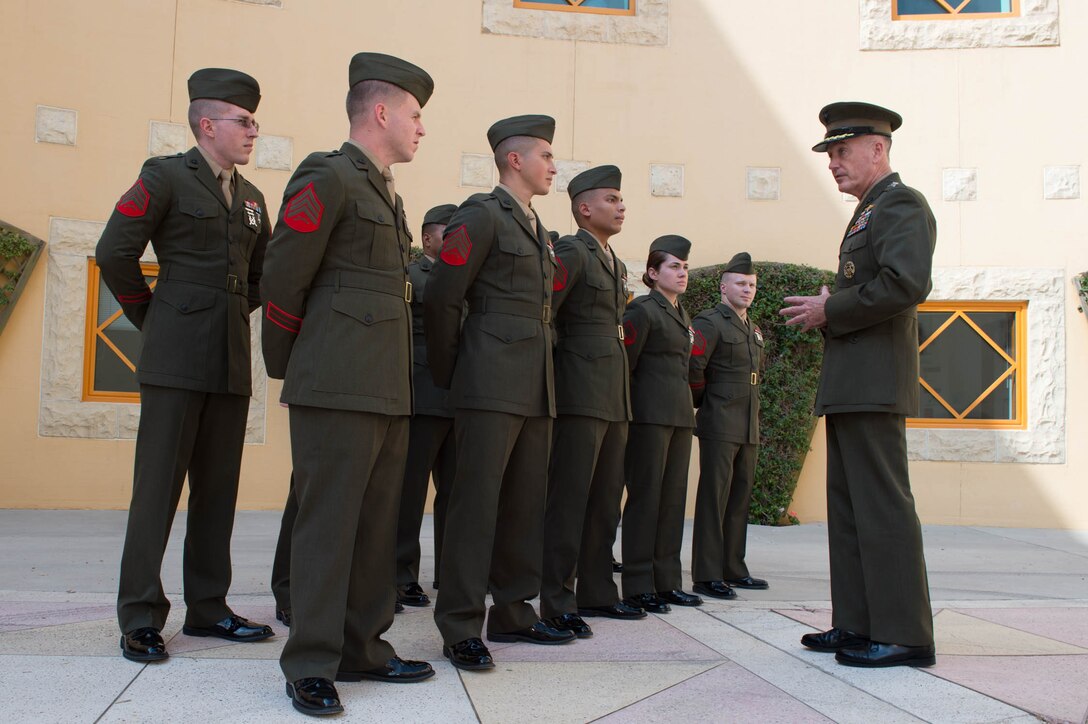 U.S. Marine Corps Gen. Joseph F. Dunford Jr., chairman of the Joint Chiefs of Staff, meets with U.S. Marines assigned to the U.S. Embassy in Amman, Jordan, Oct. 19, 2015. DoD photo by D. Myles Cullen