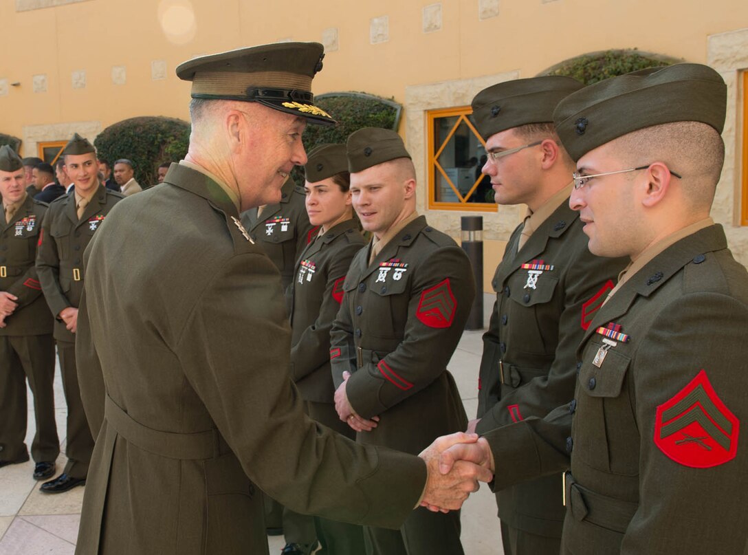 U.S. Marine Corps Gen. Joseph F. Dunford Jr., chairman of the Joint Chiefs of Staff, meets with U.S. Marines assigned to the U.S. Embassy in Amman, Jordan, Oct. 19, 2015. DoD photo by D. Myles Cullen